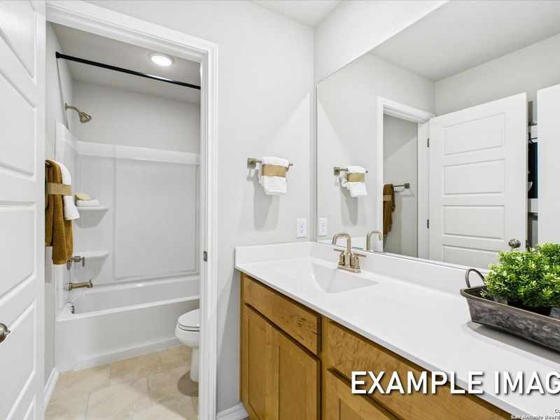 Furnished interior view inside a new home in Agave, San Antonio (Image 30).