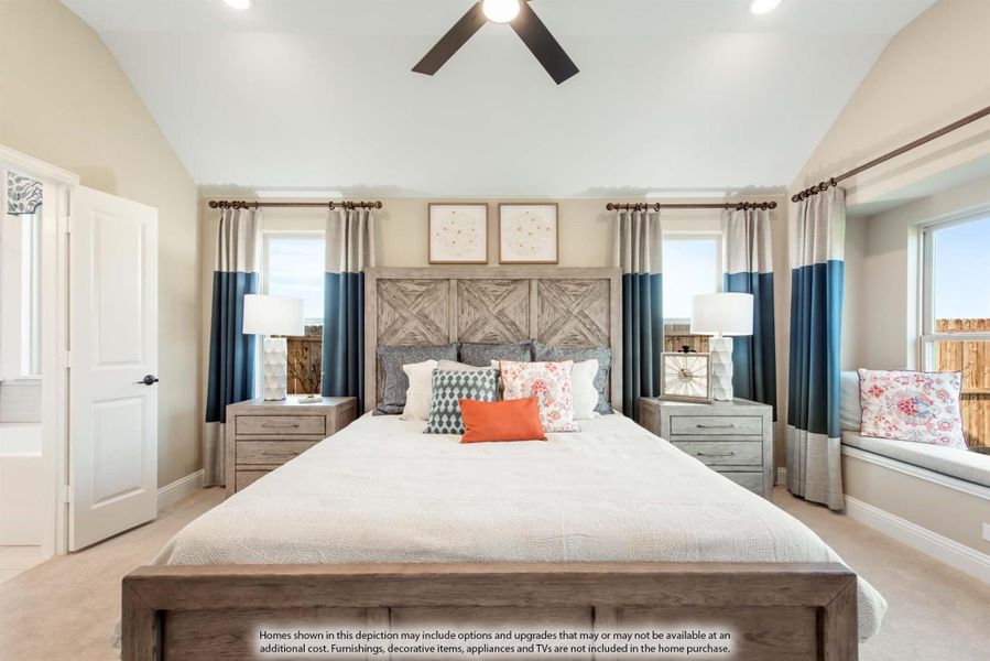 Master bedroom with vaulted ceiling, ceiling fan, wood headboard, and window seat with blue curtains