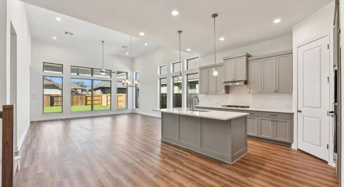 Furnished interior view inside a new home in 6 Creeks, Kyle (Image 4).