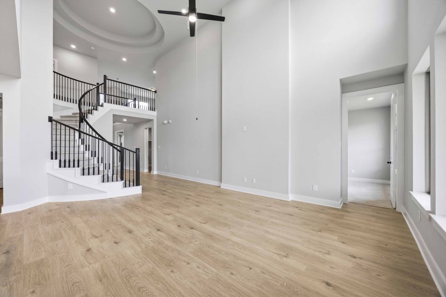 Spacious, unfurnished interior of a new home in Sunterra 50s, Katy (Image 27).