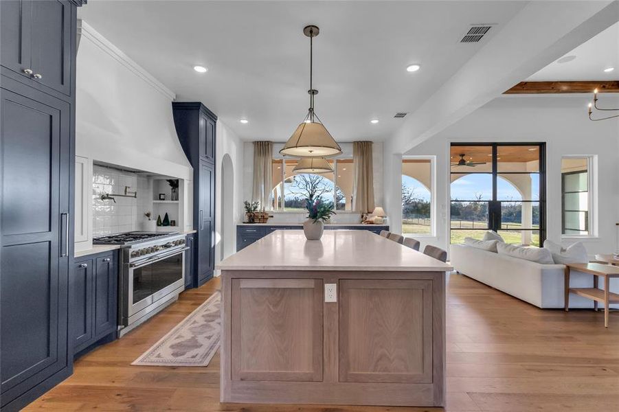 Kitchen featuring white oak 10 ft island