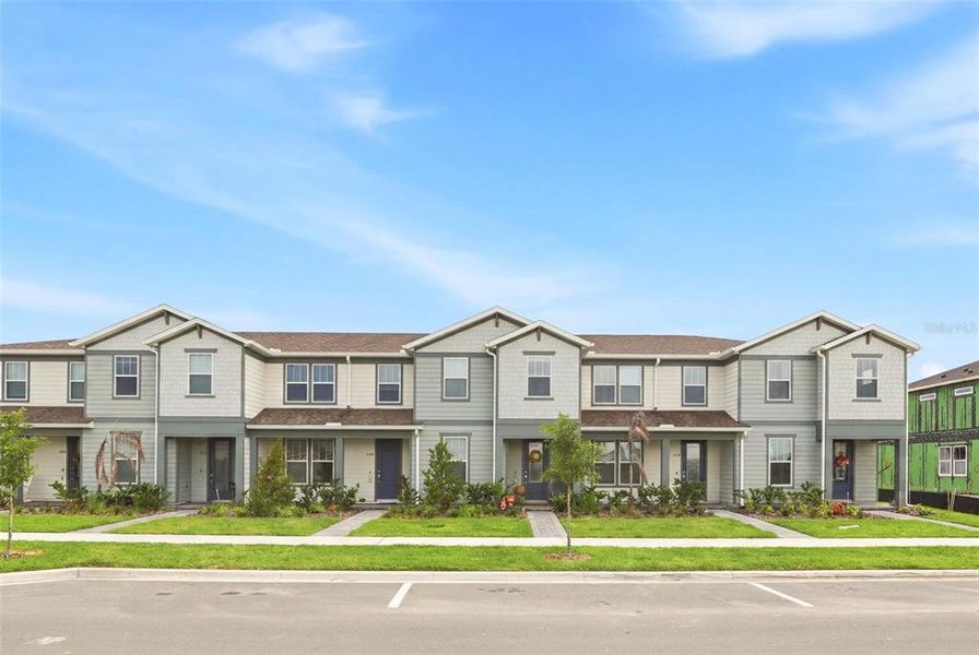 Front exterior of a new home in , Orlando, FL, highlighting curb appeal (Image 20). Front exterior of a new home in , Orlando, FL, highlighting curb appeal (Image 20).