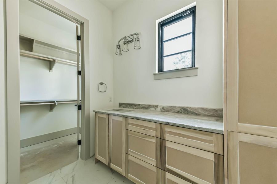 Secondary bedroom en-suite bathroom with large walk-in closet taken May 26th.