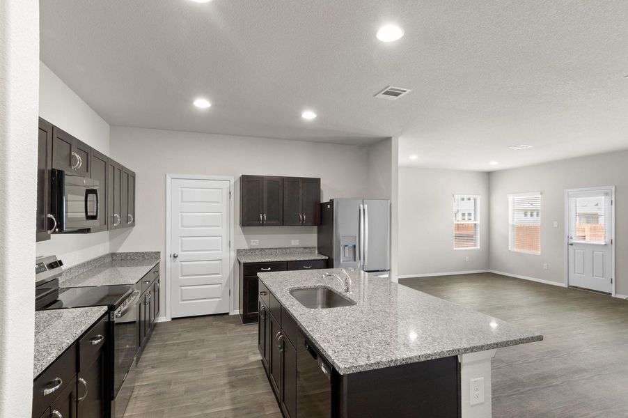 Furnished interior view inside a new home in Oaks at San Gabriel, Georgetown (Image 11).