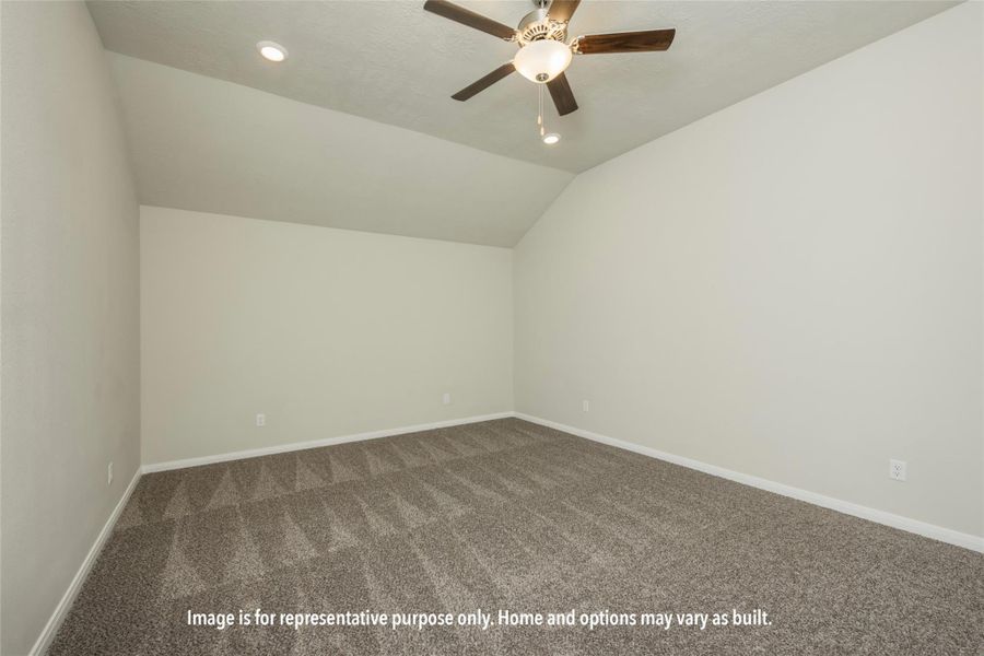 Additional living space featuring vaulted ceiling, carpet, recessed lighting, and ceiling fan