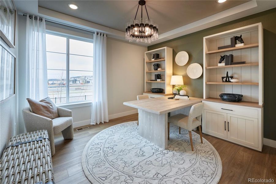 Furnished interior view inside a new home in The Aurora Highlands, Aurora (Image 22).