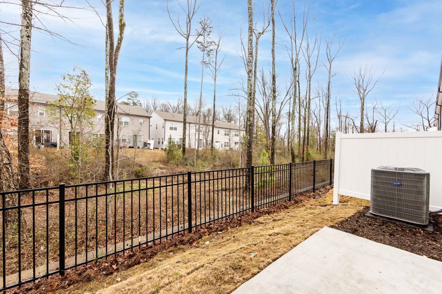 Exterior details and patio area of a home in Fifteen 15 Cannon, Charlotte (Image 3).