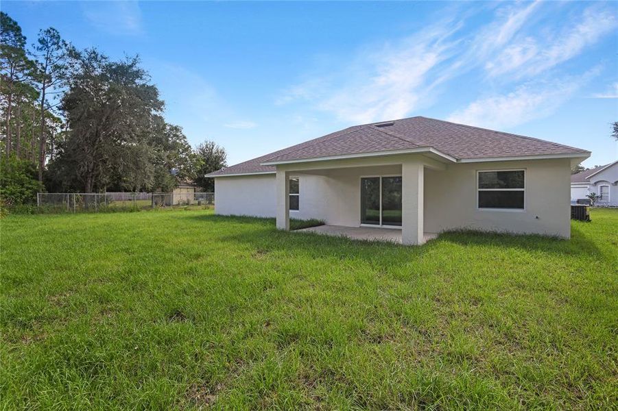 Exterior details and patio area of a home in , Kissimmee (Image 16).