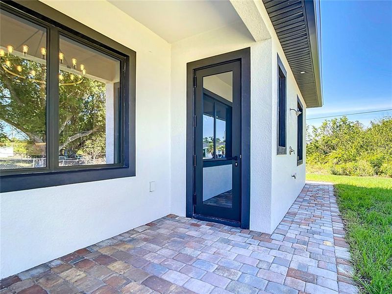 Exterior details and patio area of a home in , Englewood (Image 3).