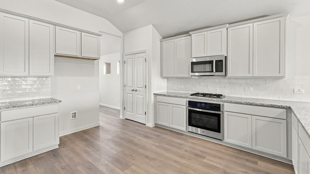 Furnished interior view inside a new home in The Oaks, Red Oak (Image 28).