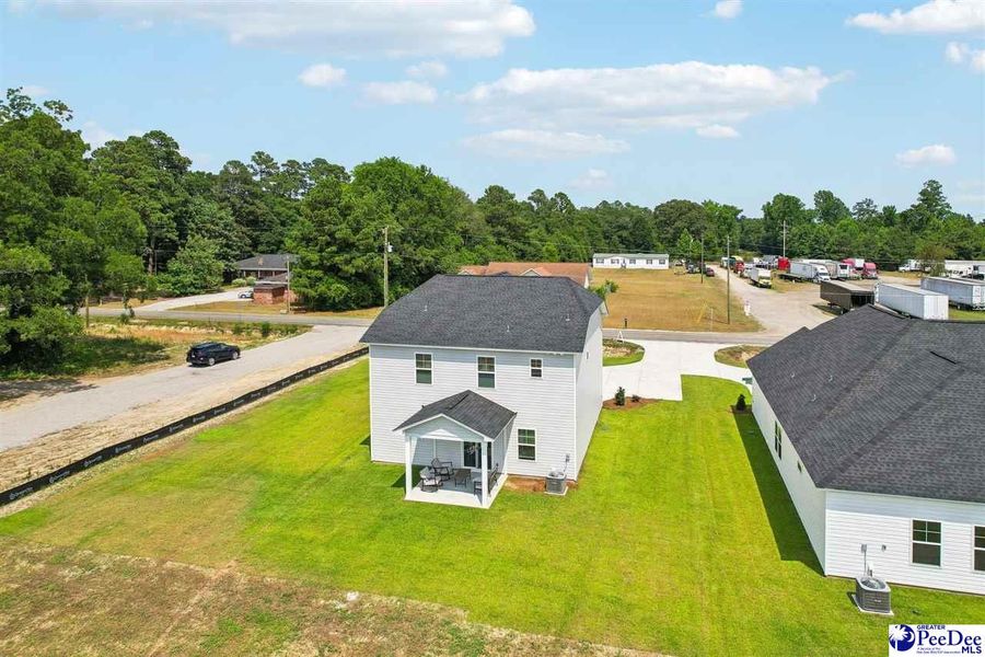 Front exterior of a new home in Southern Columns, Florence, SC, highlighting curb appeal (Image 32).