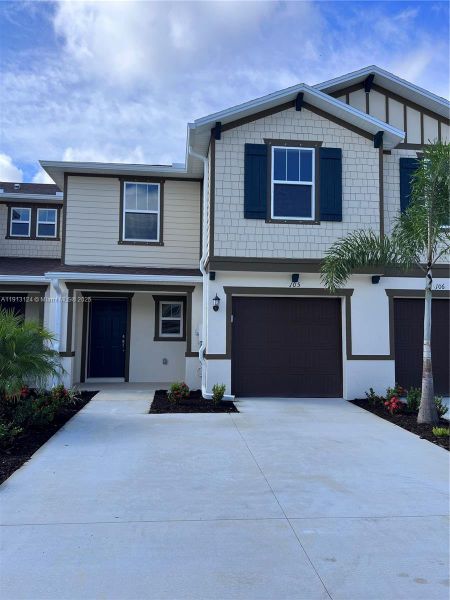 Front exterior of a new home in , Fort Myers, FL, highlighting curb appeal (Image 17). Front exterior of a new home in , Fort Myers, FL, highlighting curb appeal (Image 17).