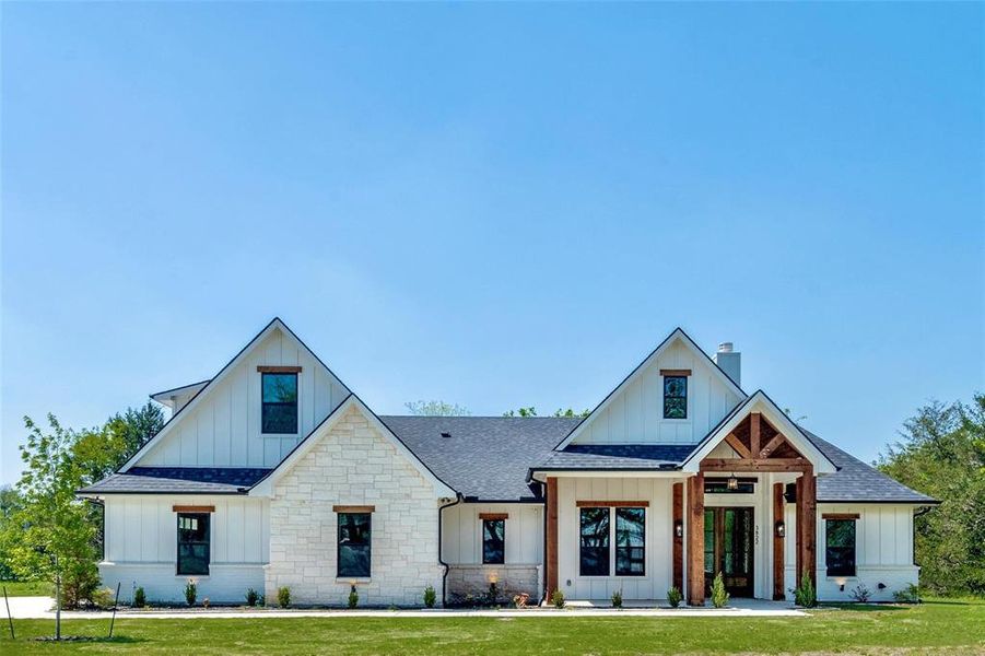 Front exterior of a new home in , Caddo Mills, TX, highlighting curb appeal (Image 20). Front exterior of a new home in , Caddo Mills, TX, highlighting curb appeal (Image 20).