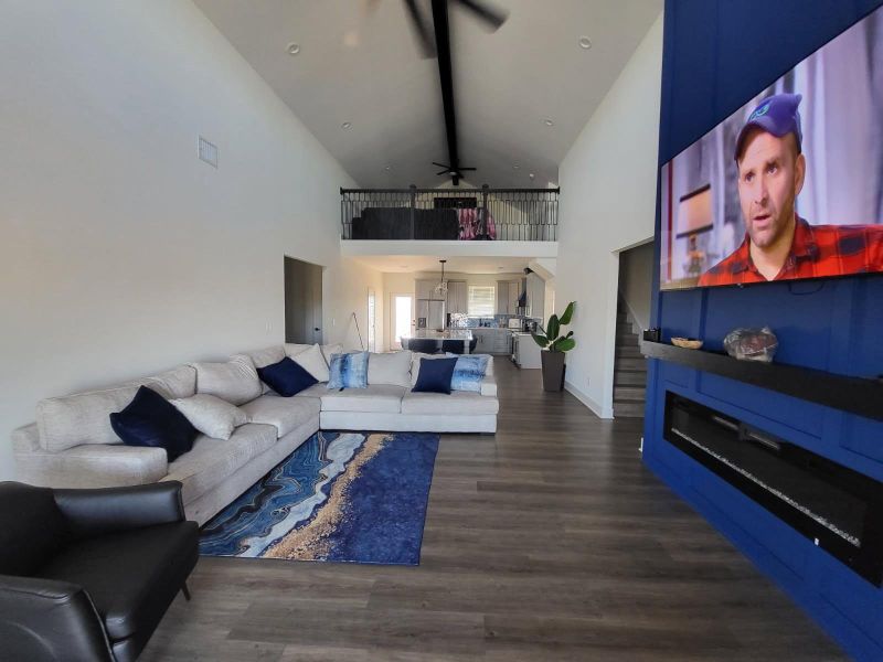 Open concept living and kitchen area. All appliances and furniture will stay with the home.