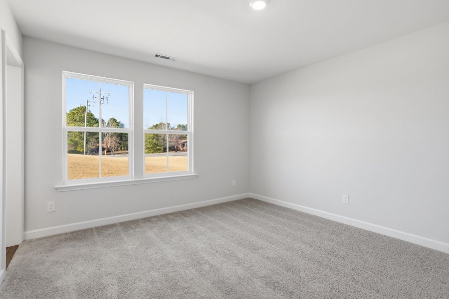 Spacious, unfurnished interior of a new home in Renaissance at White Oak, Garner (Image 33).