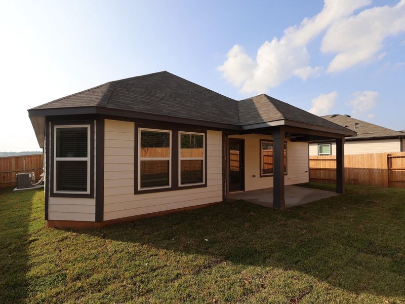 Exterior details and patio area of a home in Moran Ranch, Willis (Image 4).