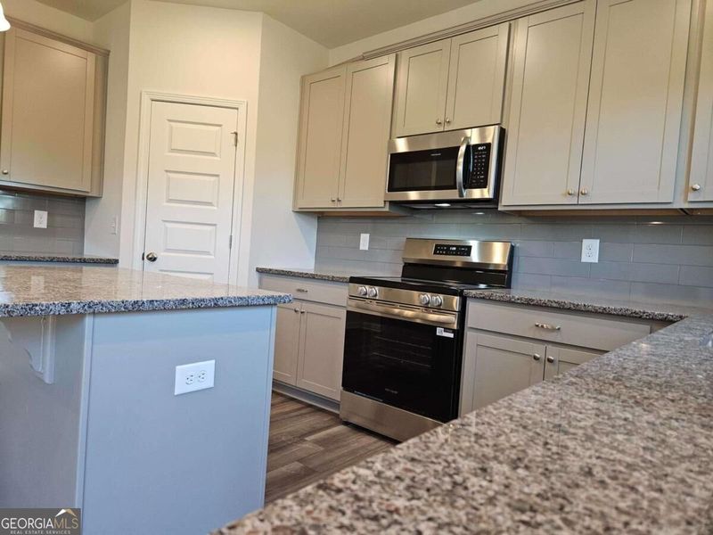 Furnished interior view inside a new home in Maddox Station, Eatonton (Image 7).