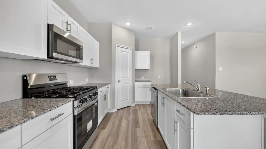 Furnished interior view inside a new home in Rosewood at Beltmill, Fort Worth (Image 6).