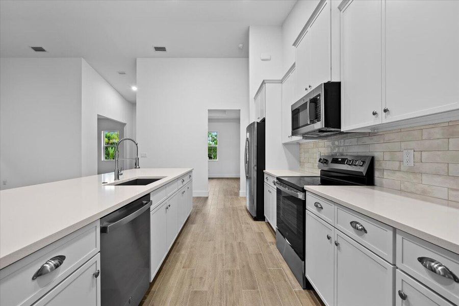 Furnished interior view inside a new home in , Loxahatchee (Image 10). Furnished interior view inside a new home in , Loxahatchee (Image 10).