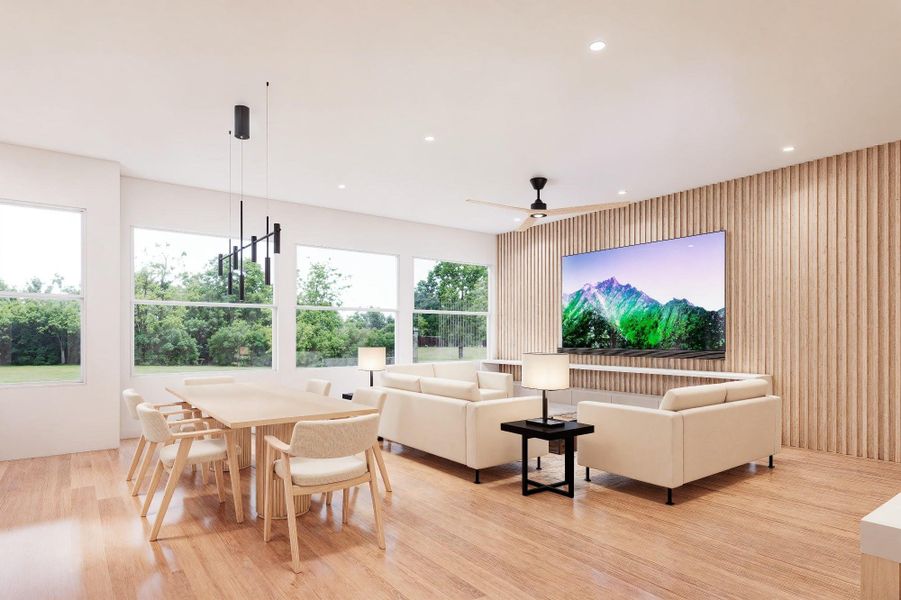 Plenty of windows for natural light and wooden accent TV  wall.