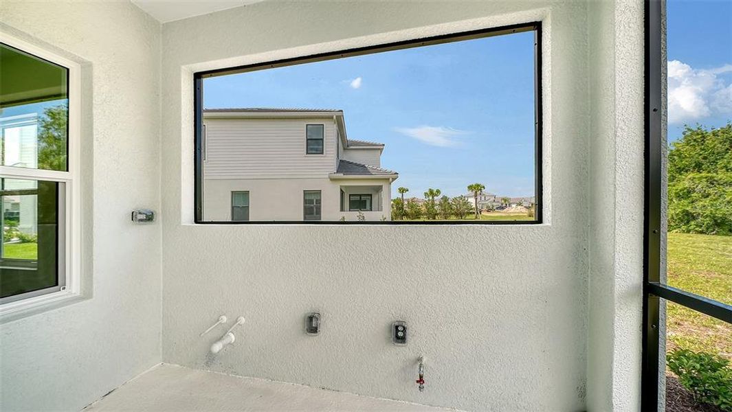 Exterior details and patio area of a home in Grand Park, Sarasota (Image 26).