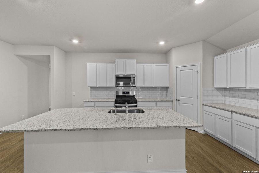 Furnished interior view inside a new home in Riverstone at Westpointe, San Antonio (Image 11).