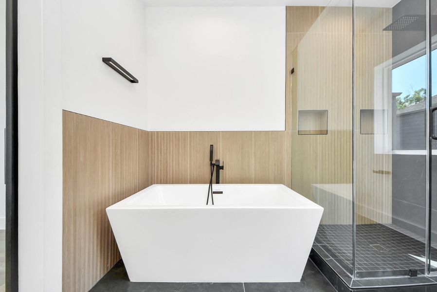 Soaking tub in primary bathroom