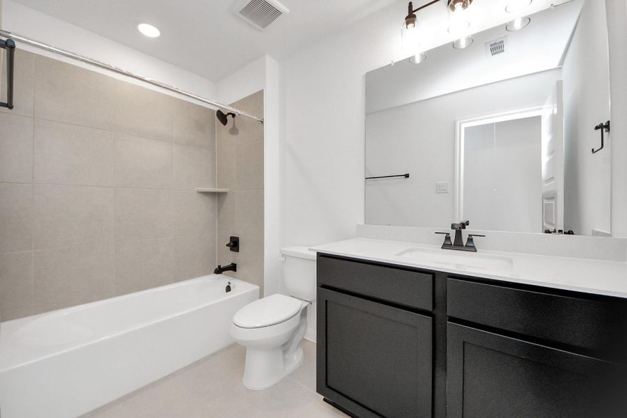 Furnished interior view inside a new home in Elyson, Katy (Image 6).