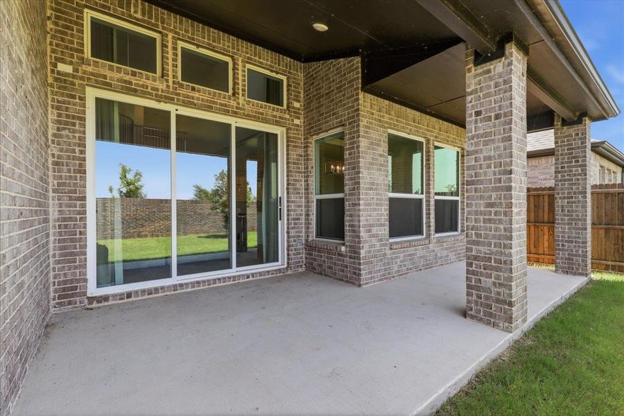 Exterior details and patio area of a home in Valencia on The Lake, Little Elm (Image 22). Exterior details and patio area of a home in Valencia on The Lake, Little Elm (Image 22).