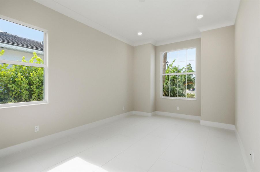 Furnished interior view inside a new home in The Strand, Vero Beach (Image 3).
