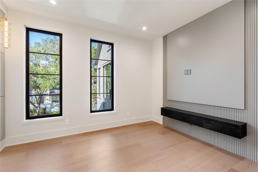 Example of the primary bedroom, much larger than shown in this picture. NOTE: This photo is a rendering of one of the builder’s prior homes and similarly used as an example for this home. Please contact the listing agent to tour this property and for more detailed information.