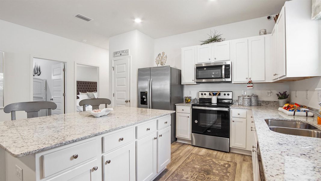 Representative furnished interior of a home built from the Bayberry by D.R. Horton in Owl's Head East, Freeport (Image 10). Representative furnished interior of a home built from the Bayberry by D.R. Horton in Owl's Head East, Freeport (Image 10).