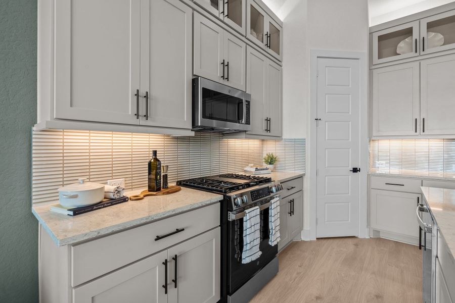 Furnished interior view inside a new home in Centero at Stone Oak, San Antonio (Image 16).