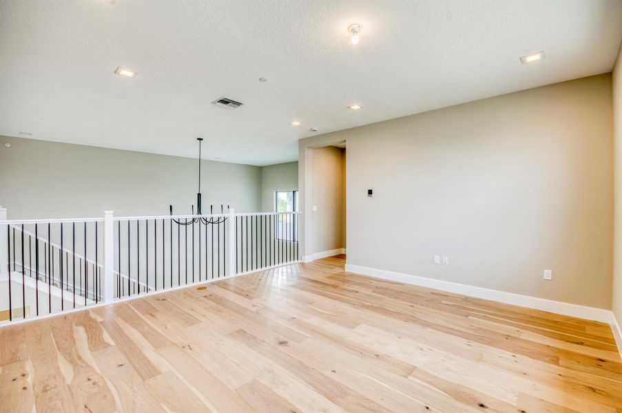 Furnished interior view inside a new home in Apex at Avenir, Palm Beach Gardens (Image 33).