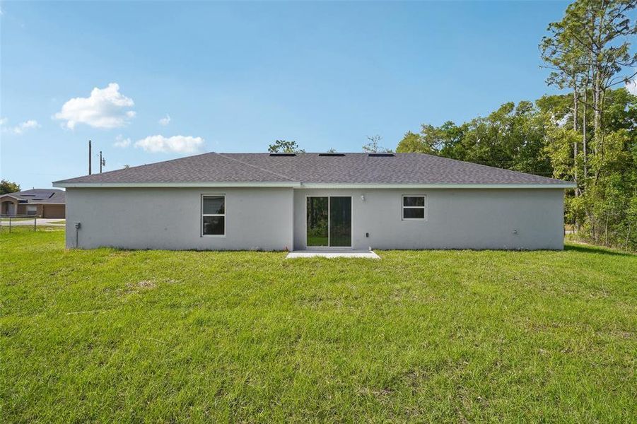 Exterior details and patio area of a home in , Ocala (Image 4).