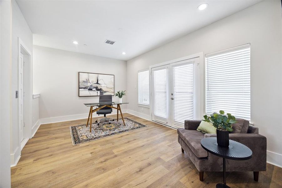 Another view of the fourth floor space. The French doors lead out onto the rooftop deck.