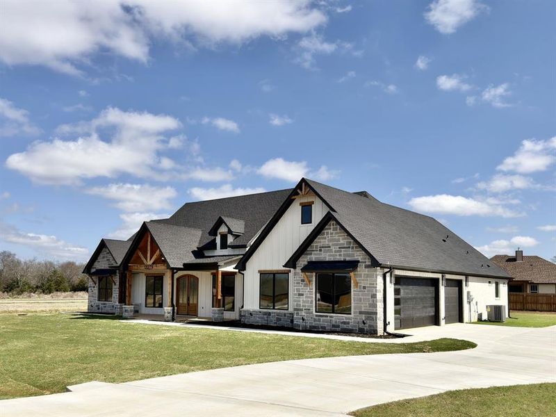Front exterior of a new home in , Bullard, TX, highlighting curb appeal (Image 21). Front exterior of a new home in , Bullard, TX, highlighting curb appeal (Image 21).