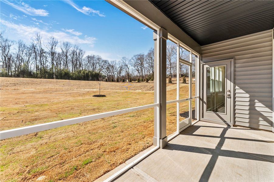 Enjoy tranquil views from this inviting covered pa Enjoy tranquil views from this inviting covered pa