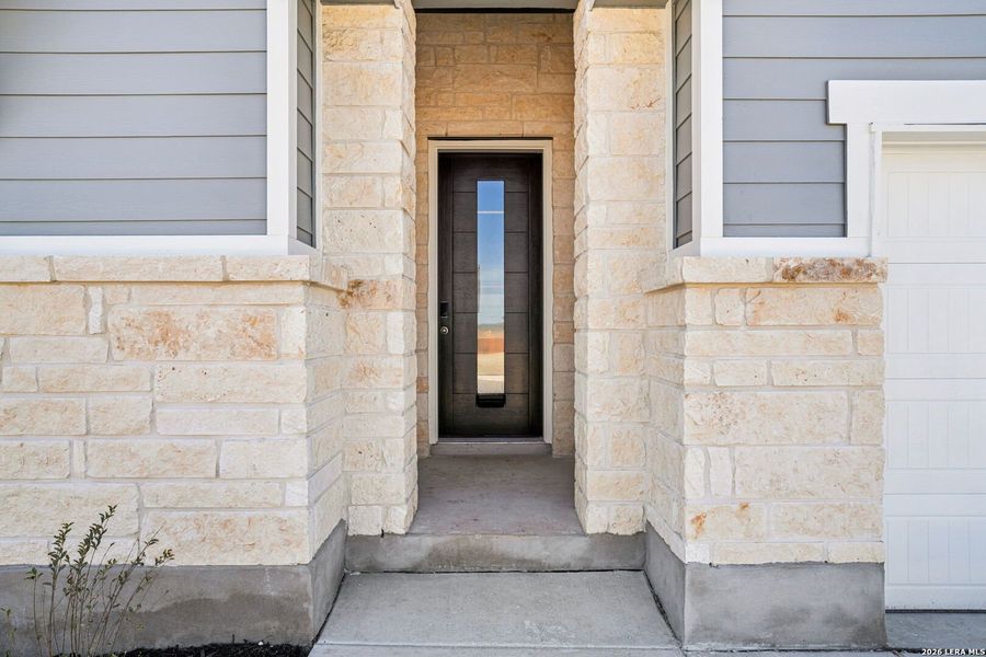 Exterior details and patio area of a home in Estancia Ranch - Classic Series, San Antonio (Image 24).