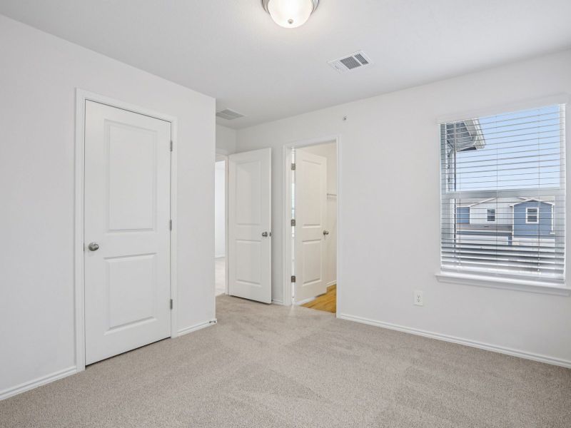 Spacious, unfurnished interior of a new home in Waterstone Village, Kyle (Image 13).