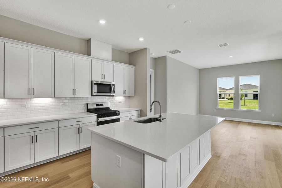 Furnished interior view inside a new home in Hyland Trail, Green Cove Springs (Image 7).