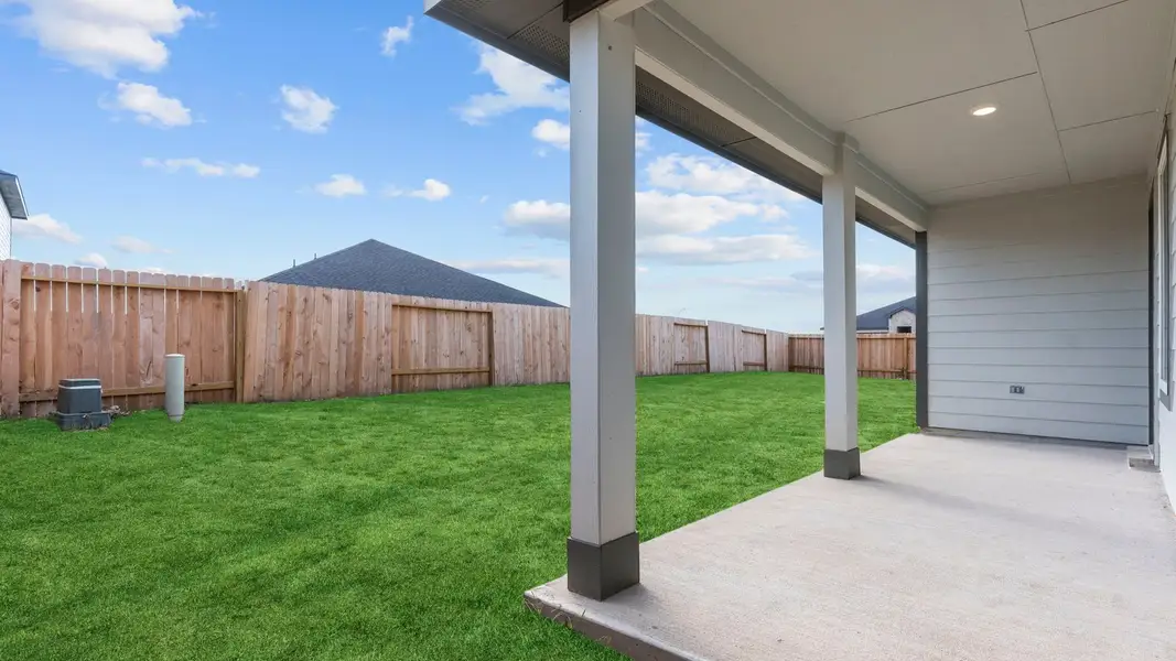 Exterior details and patio area of a home in Evergreen, Rosenberg (Image 3). Exterior details and patio area of a home in Evergreen, Rosenberg (Image 3).