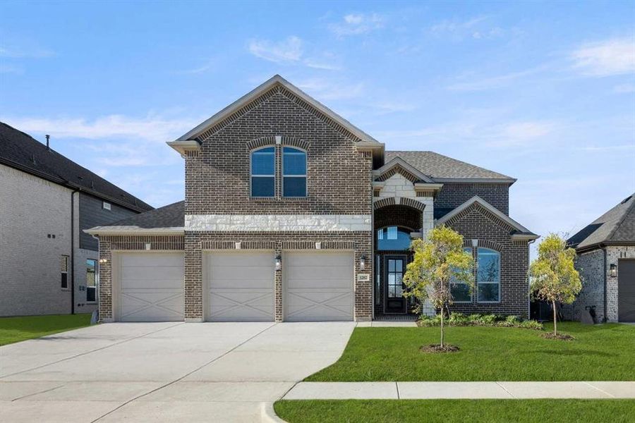 Front exterior of a new home in Birdsong - Harwood, Mansfield, TX, highlighting curb appeal (Image 2). Front exterior of a new home in Birdsong - Harwood, Mansfield, TX, highlighting curb appeal (Image 2).