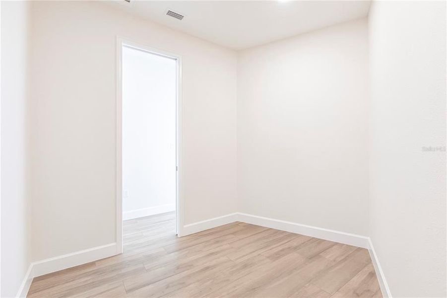 Spacious, unfurnished interior of a new home in , Port Charlotte (Image 55).