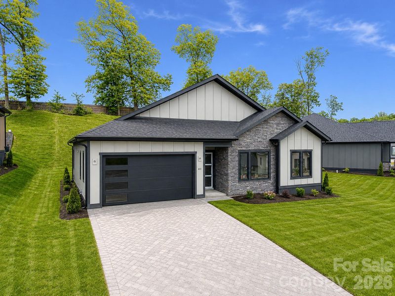 Front exterior of a new home in , Arden, NC, highlighting curb appeal (Image 14).