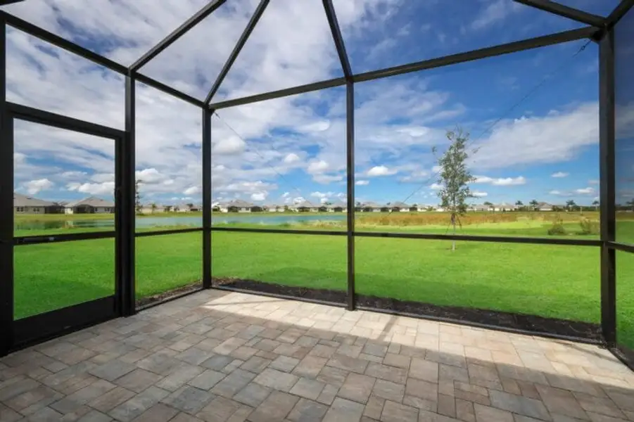 Exterior details and patio area of a home in Reflection Villas at Watercolor Place, Bradenton (Image 4).