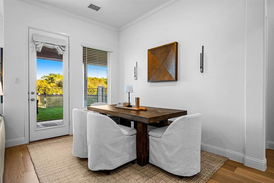 Breakfast area and the door to the back patio. Breakfast area and the door to the back patio.
