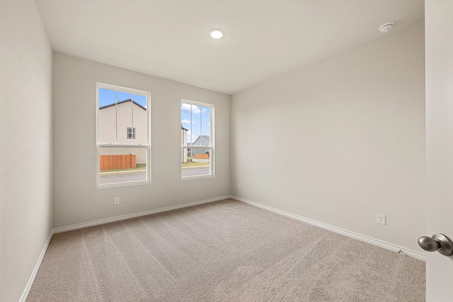 Spacious, unfurnished interior of a new home in The Cottages at Lariat, Liberty Hill (Image 32).