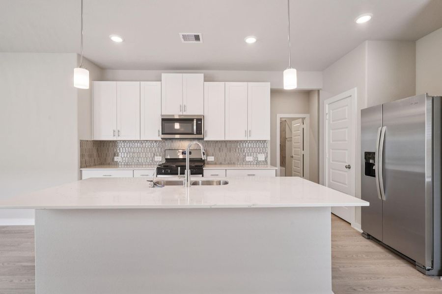 Photo is not of the actual home, but is an inspirational photo of builder’s model home and may depict options, furnishings, and/or decorator features that are not included