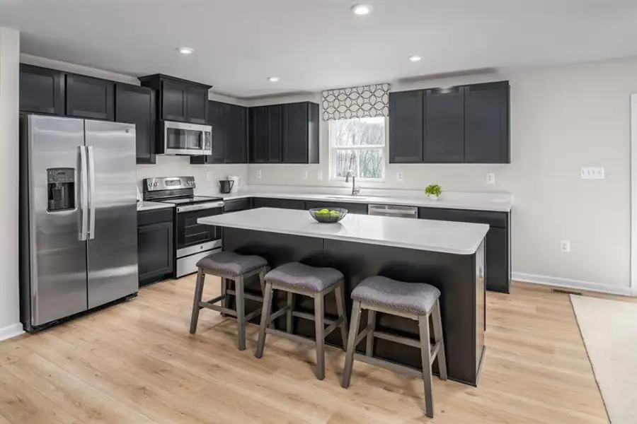 Representative furnished interior of a home built from the Hazel by Ryan Homes in Partridge Village, Lillington (Image 4).